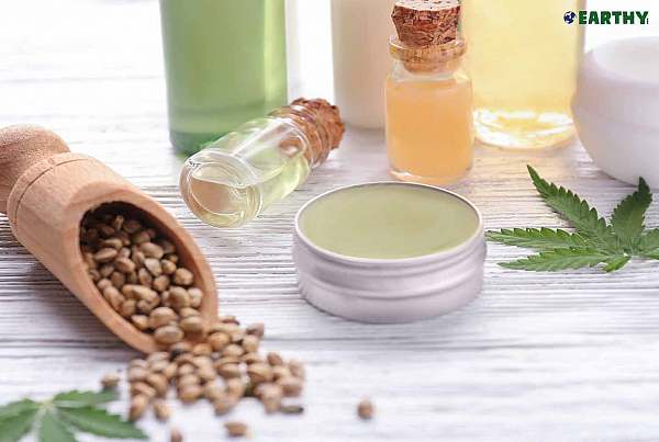 Cannabis terpenes in cosmetics, pot leaf, vials, seeds, salve, earthy now logo