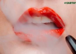 Woman's lips exhaling cannabis derived terpenes. Earthy Now logos